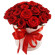 красные розы в шляпной коробке. Танзания